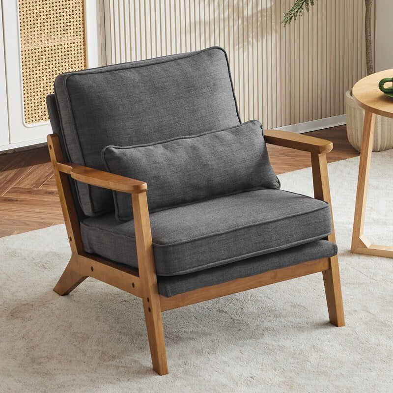 Poltrona d'accento rivestita in misto lino con gambe in legno e un cuscino, beige