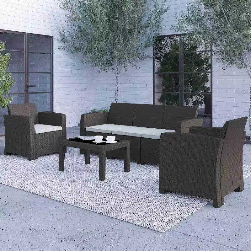 Merrick Lane 4 Piece Faux Rattan Patio Furniture Set with 2 Chairs and Sofa with Removable Beige Cushions and Table